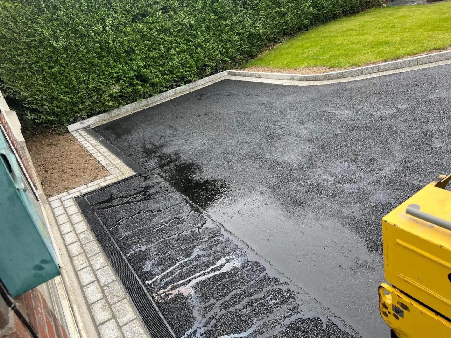 Fresh tarmac repair and reinstatement area